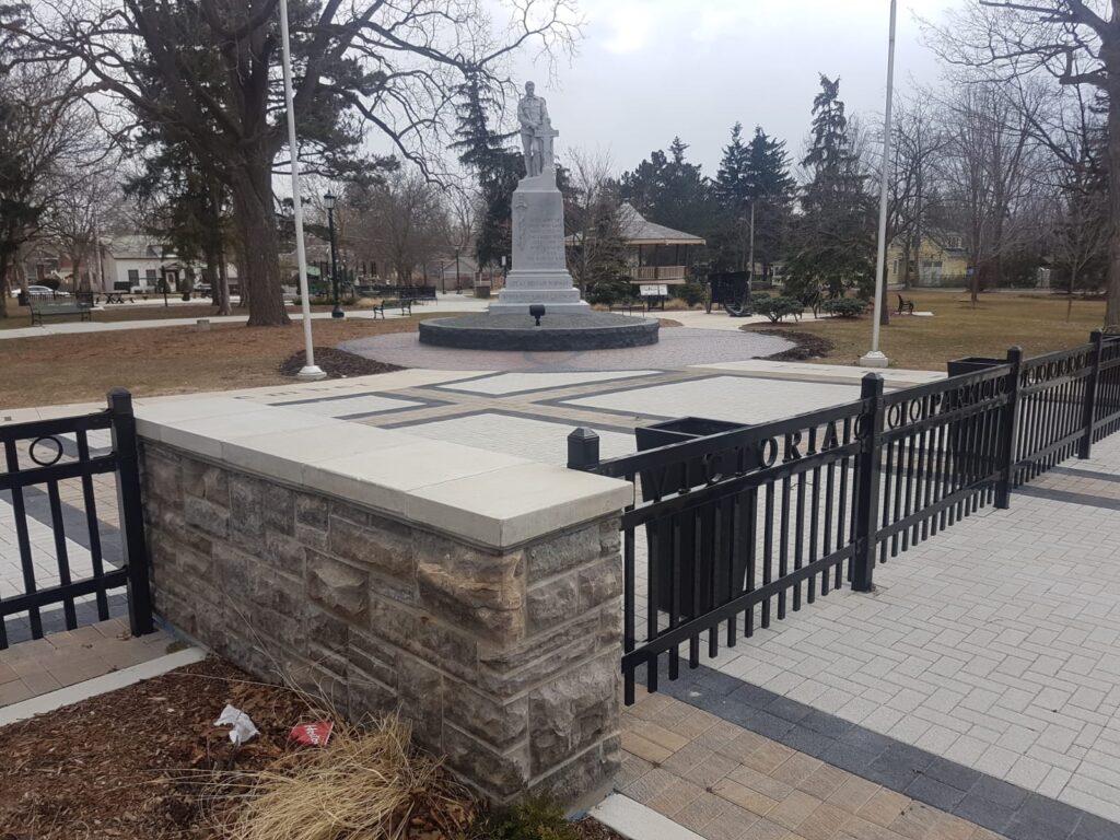 Tigerstrip hand-chiseled stone pillars with smooth granite capping at Milton City Hall, serving Aurora, Stouffville, East Gwillimbury, Nobleton, King City, Richmond Hill, Oakville, North York, and surrounding GTA areas