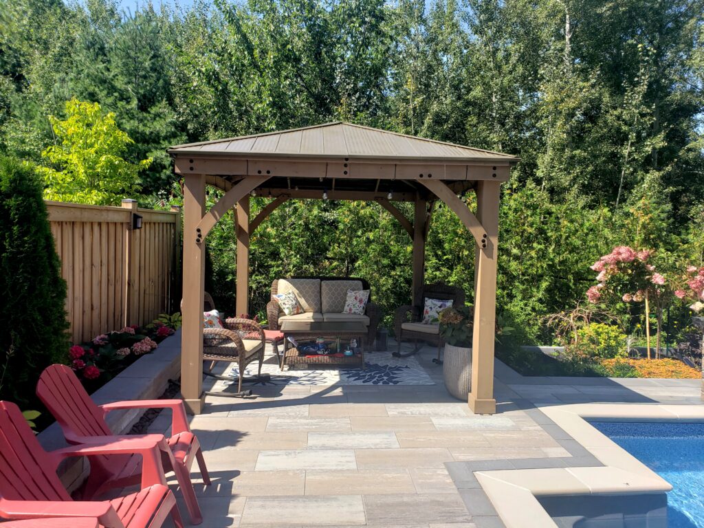 Backyard interlocking and custom waterfall in Aurora, stouffville, Richmond hill and Newmarket and Oakville